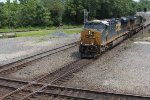 CSX 869 leads M205